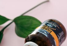 정신 건강에 좋은 음식과 운동의 상관관계 a close up of a bottle of pills next to a plant