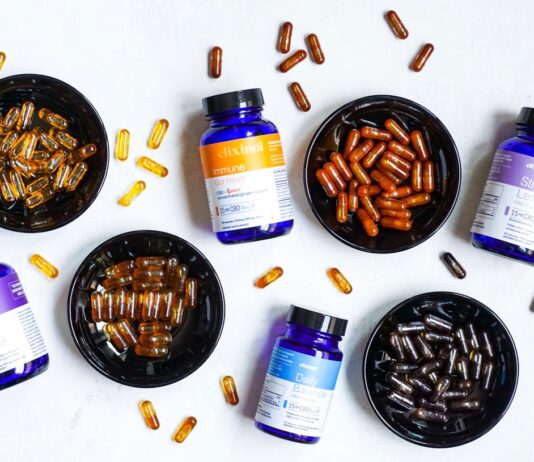 “영양과 보충제, 우리 생활에 어떻게 녹일까” blue and white plastic bottle beside brown round ashtray